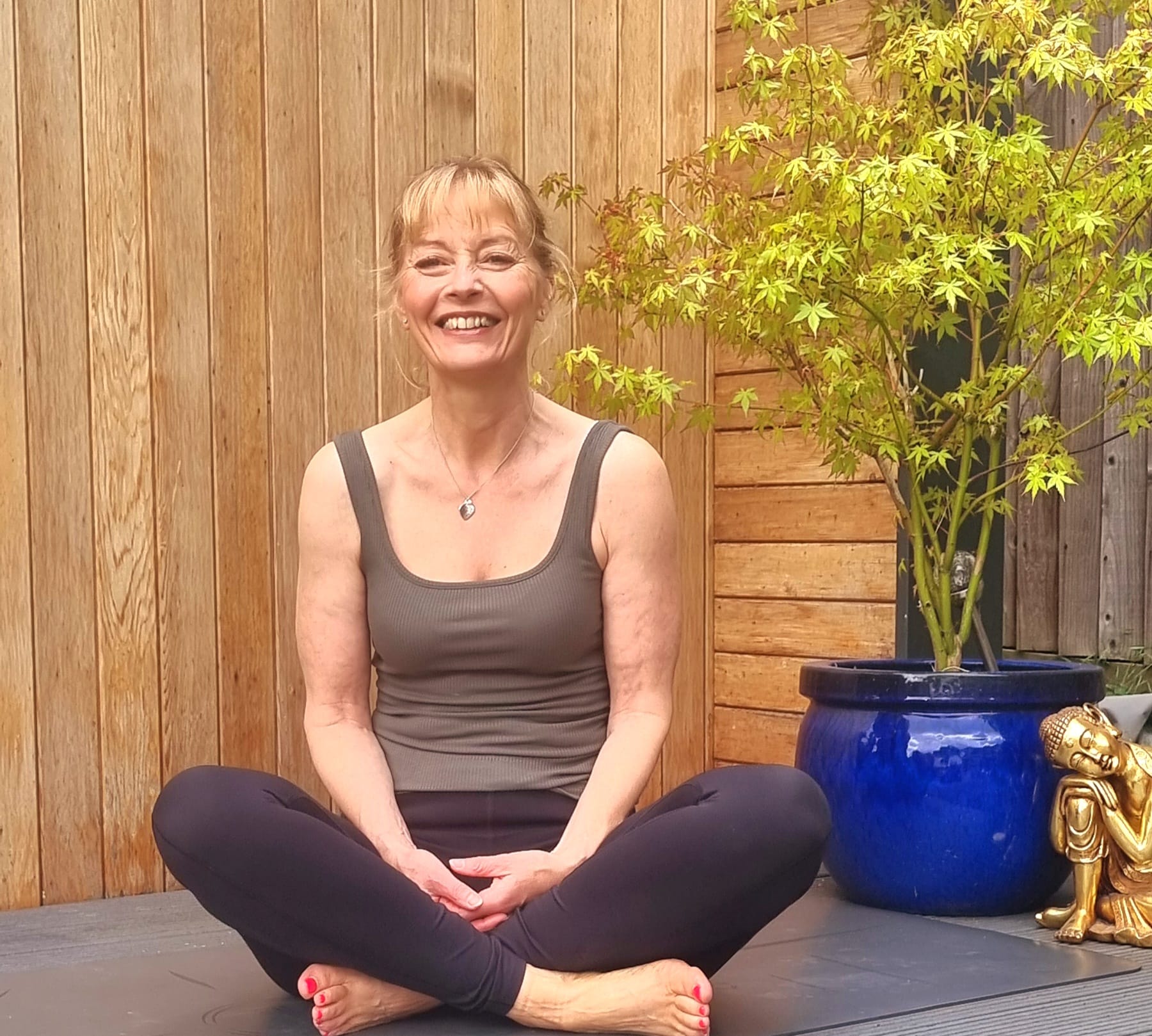 Person sitting in a lotus pose